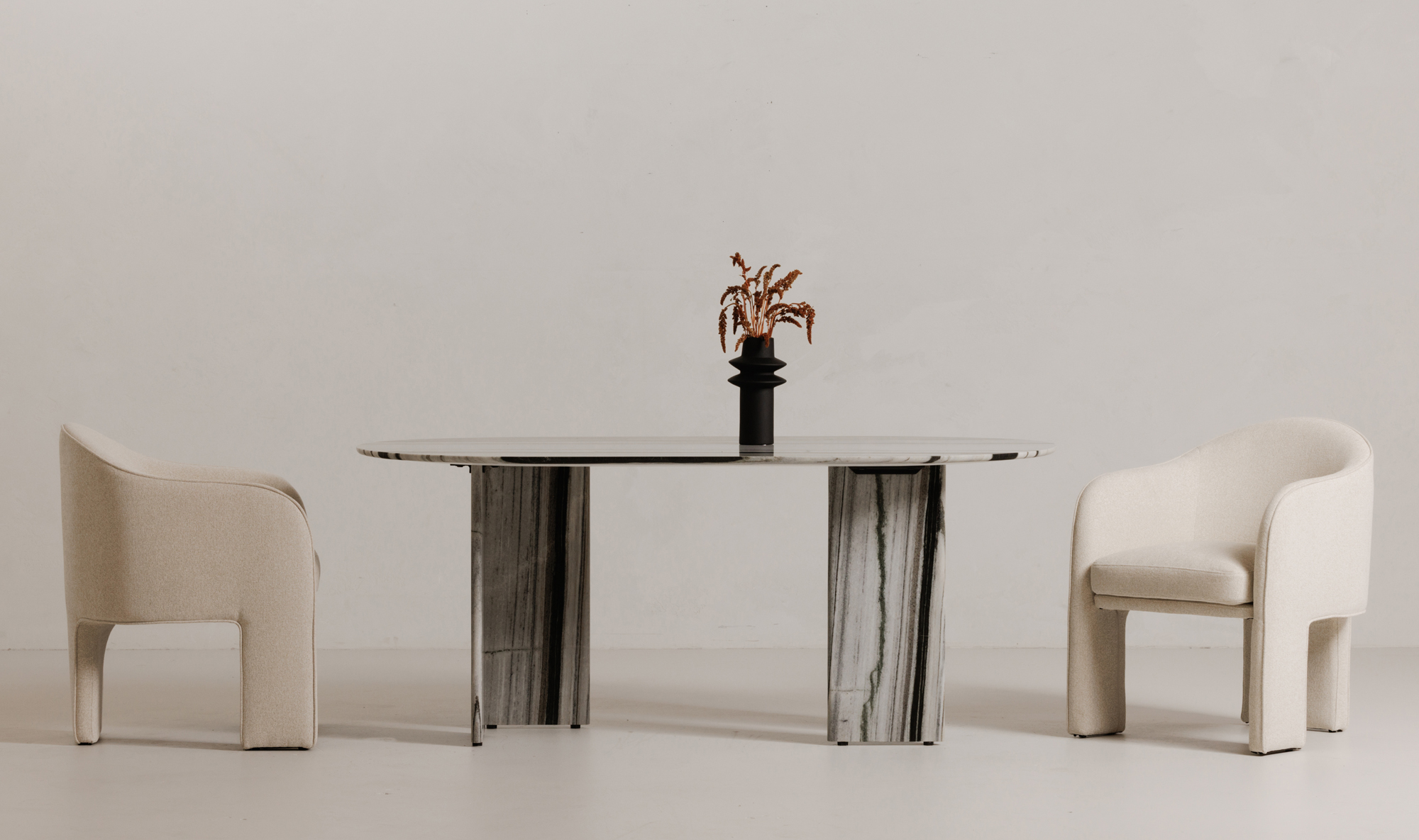 Celia Dining Table – Panda Marble Oval with Geometric Base