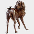 Rubbed Red Dog and Butterfly Sculpture