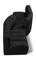 Anwen 108" Vegan Leather Upholstered 4pc. Modular Sectional
