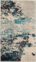 Celestial Ivory Teal Blue Modern Polypropylene Area Rug