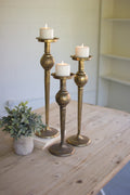 Set of Three Antique Brass Finish Candle Stands