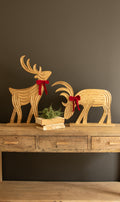 Set of Two Carved Mango Wood Reindeer with Red Velvet Ribbon